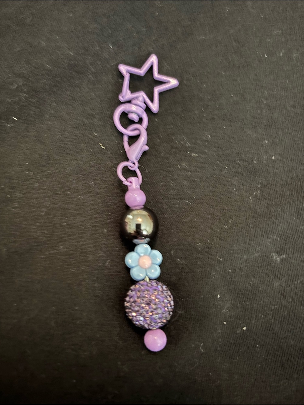 Purple beaded flower keychain